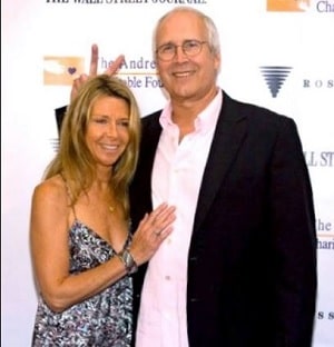 A picture of Caley's parents; Chevy Chase and Jayni Chase.